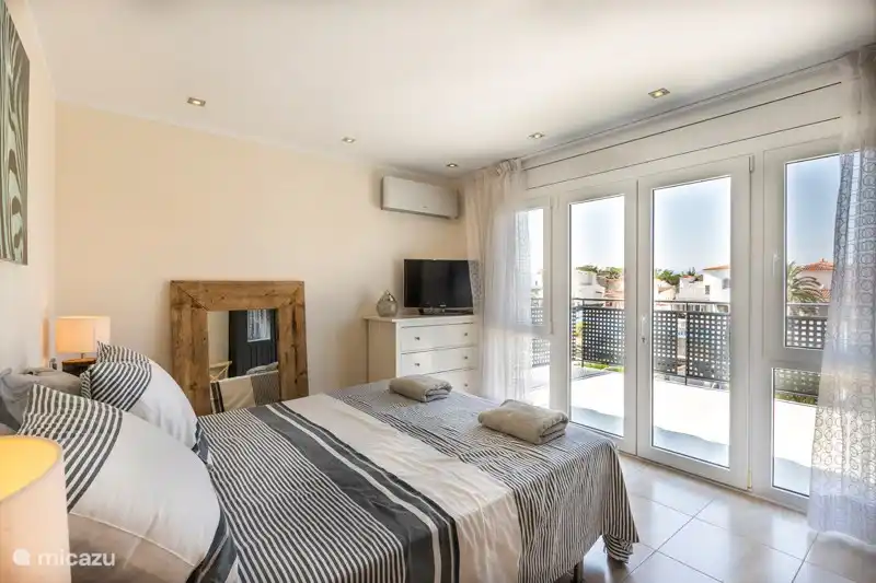Master bedroom overlooking the backyard.