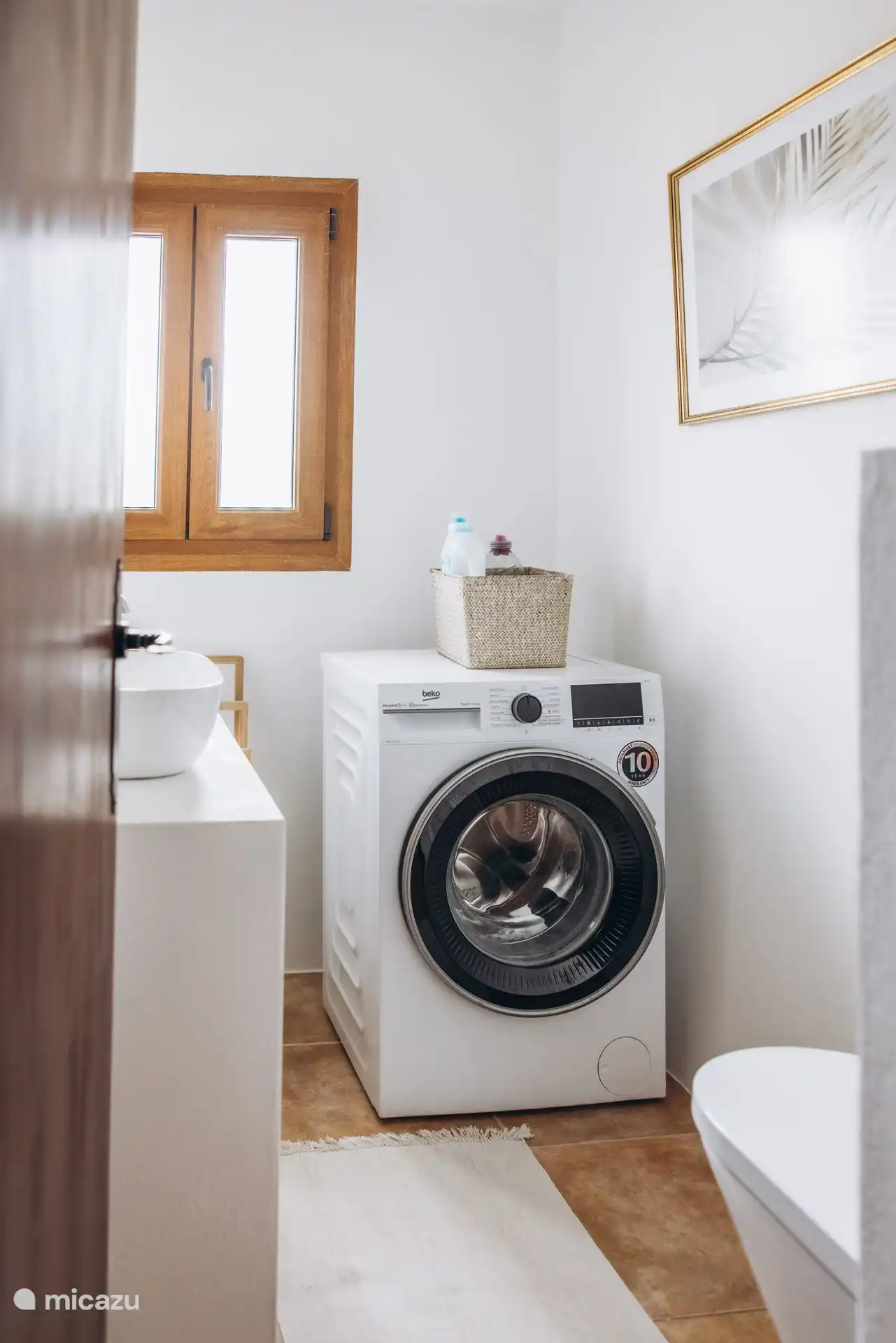 Small bathroom with washing machine