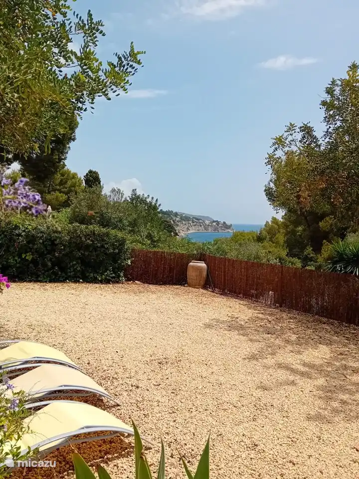 Place for two cars in the back of the garden.