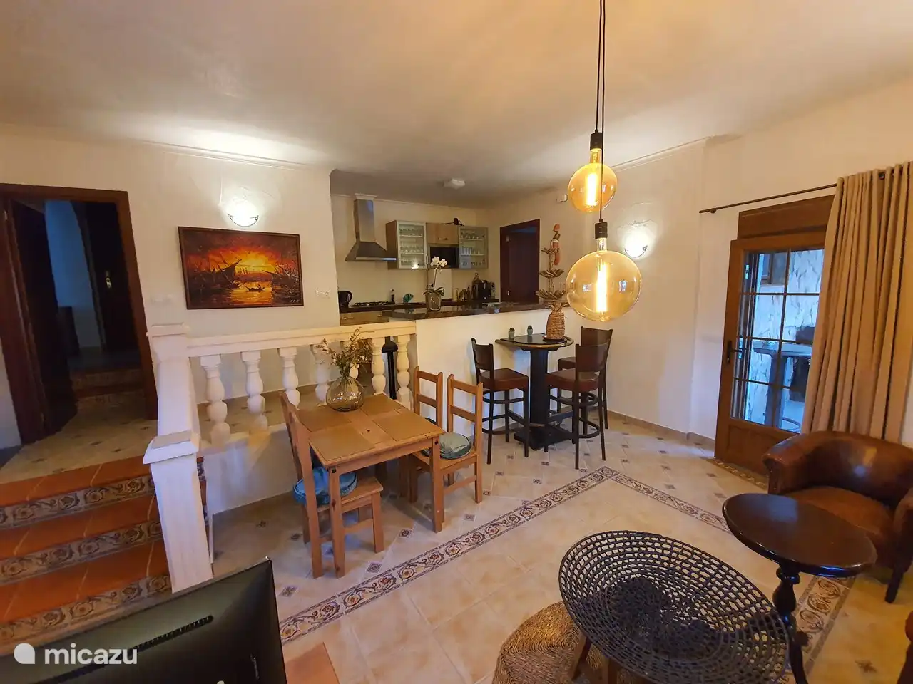 Split level living room/kitchen in lower apartment.