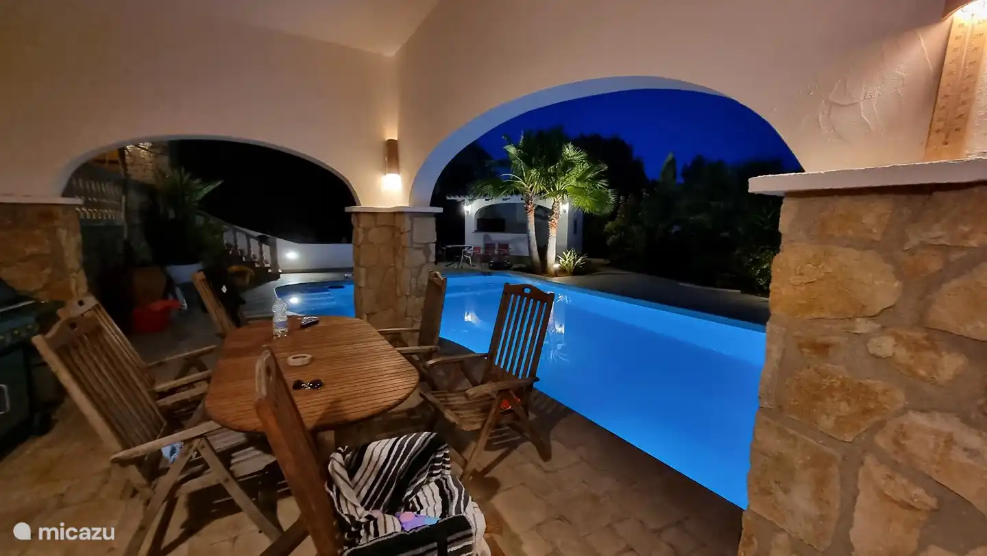 Naya (covered terrace) of lower poolside apartment.