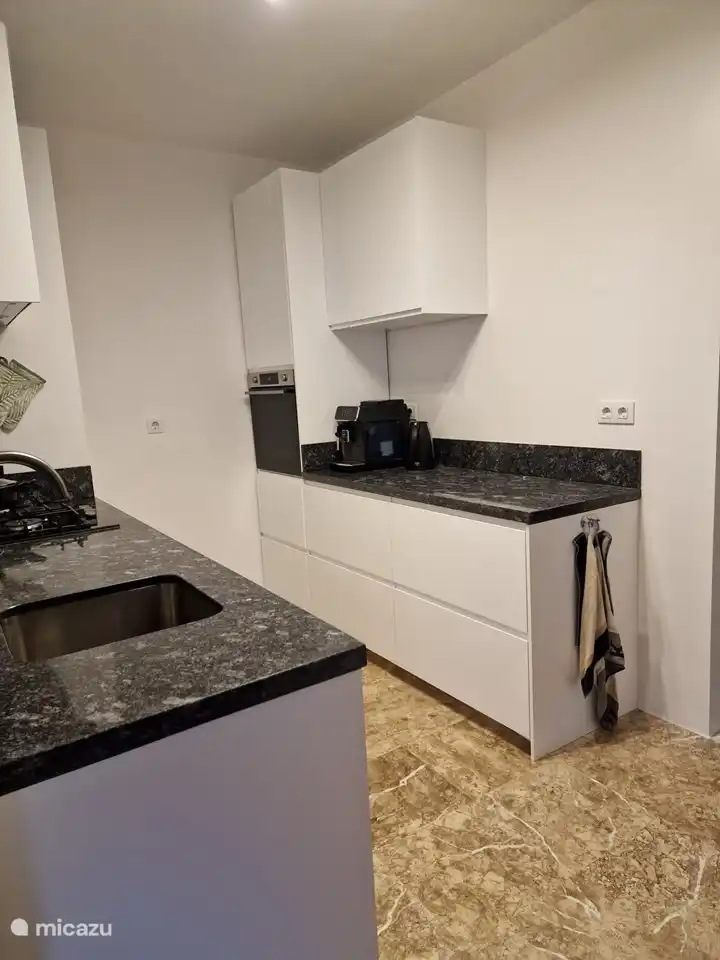 Kitchen in upper apartment right side