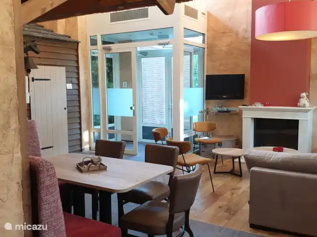 Location de Vacances Pays-Bas, Brabant-Septentrional, Schaijk, maison de vacances - La petite lisière de la forêt Salle à manger et porte donnant sur la terrasse extérieure