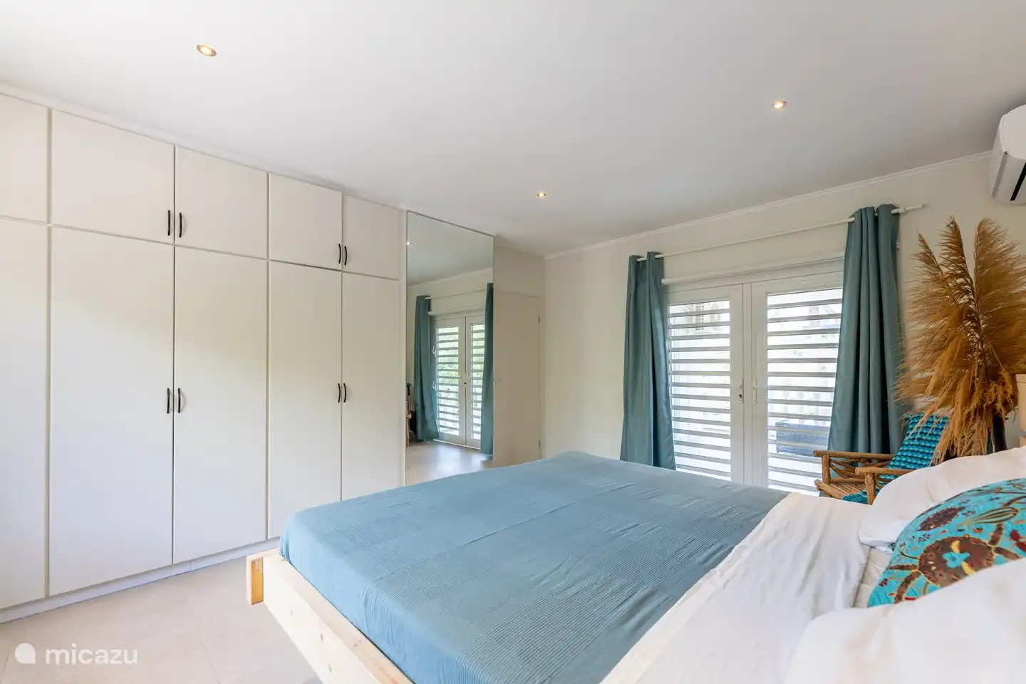 Upper floor: Bedroom 2 with wardrobe.