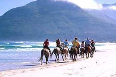 Paardrijden op het strand van Noordhoek