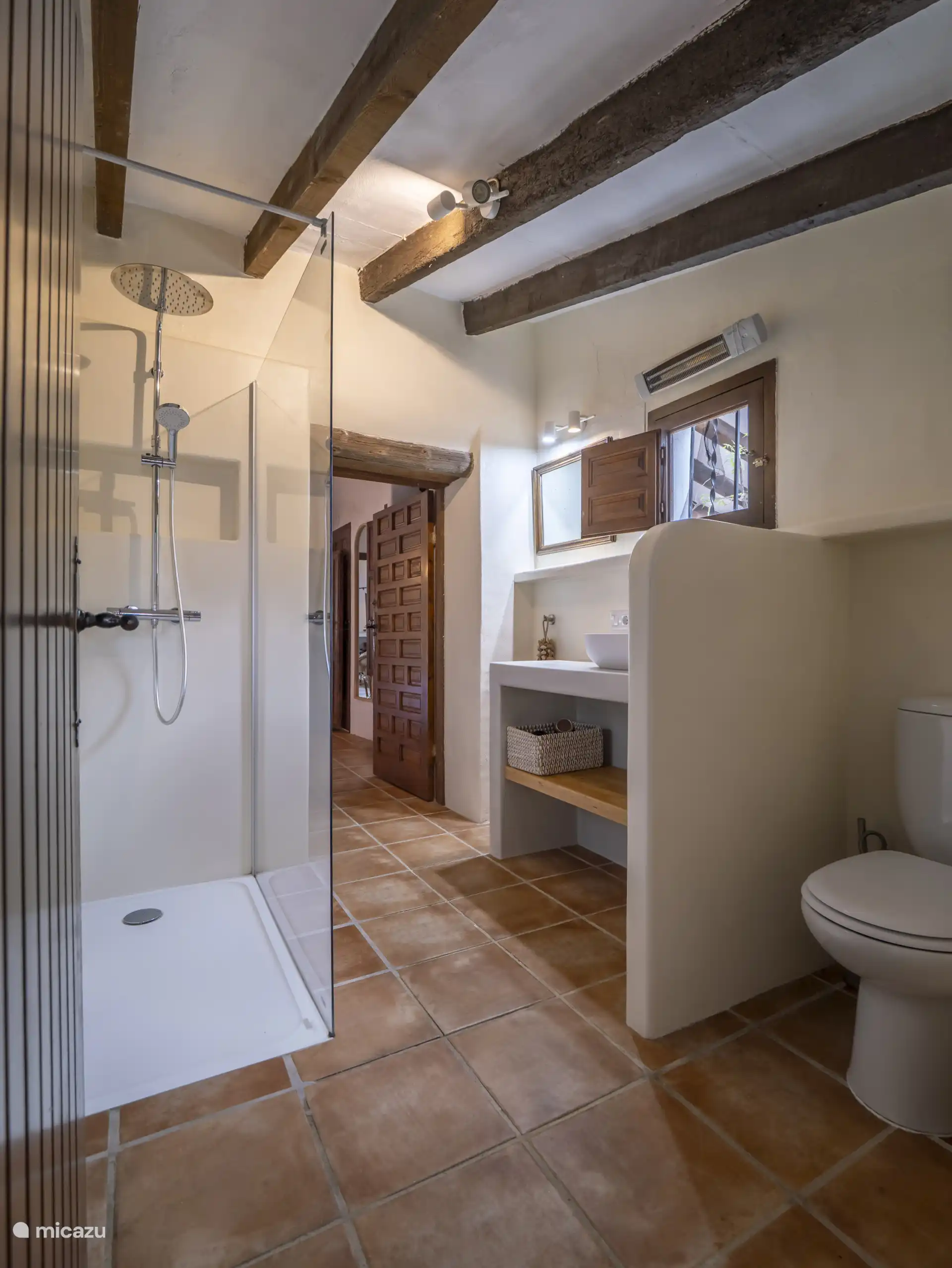 The bathrooms on the ground floor are both equipped with a shower, sink and toilet.