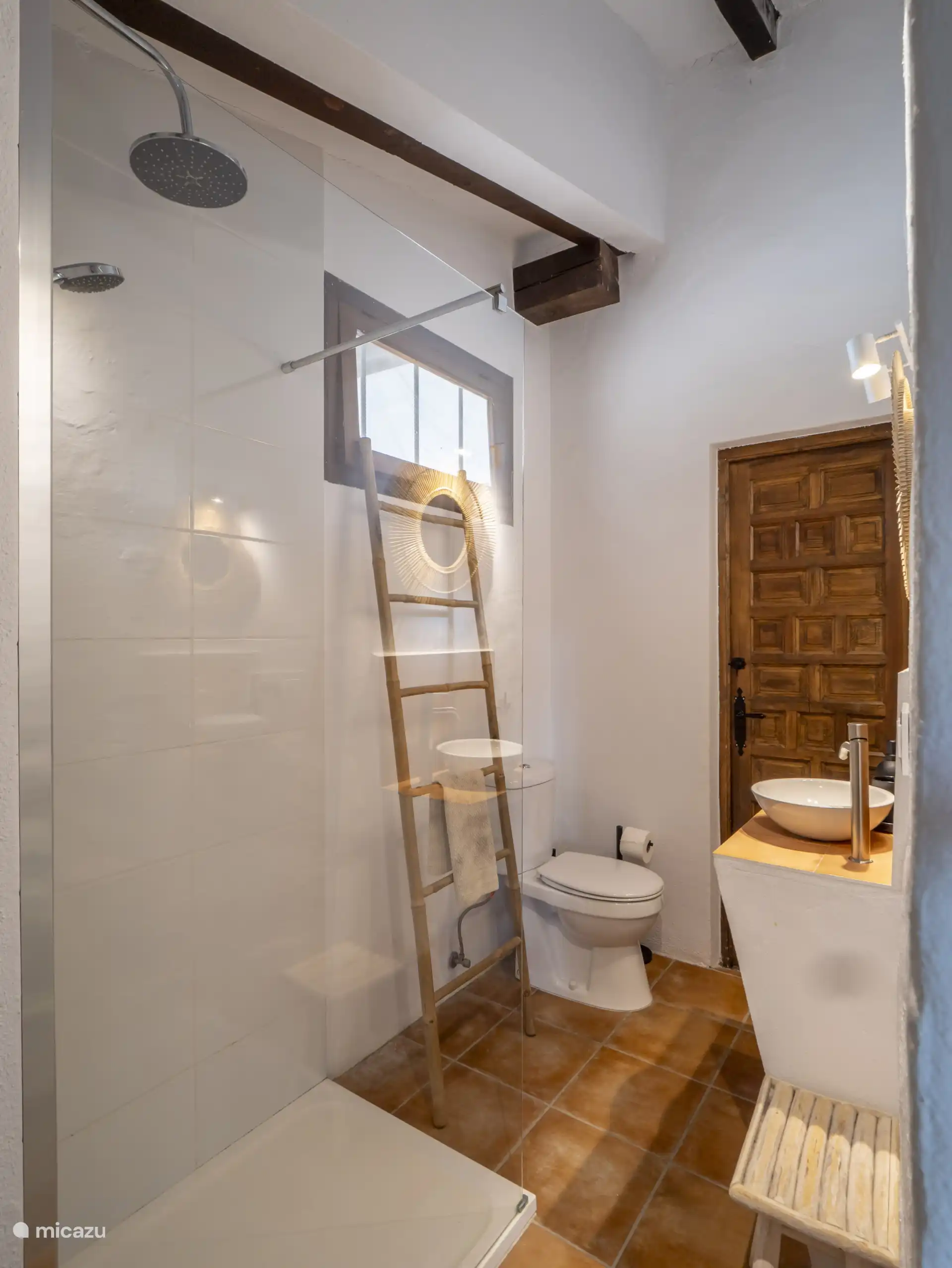 The bathrooms on the ground floor are both equipped with a shower, sink and toilet.