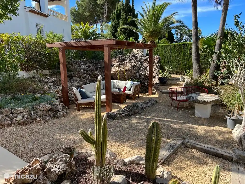 Terraza con juego de salón.