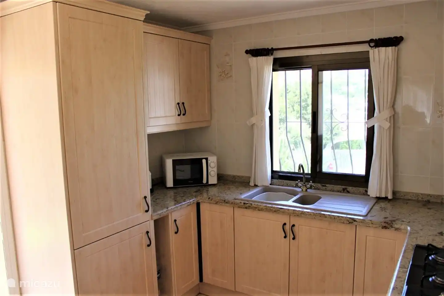 Spacious kitchen with all amenities