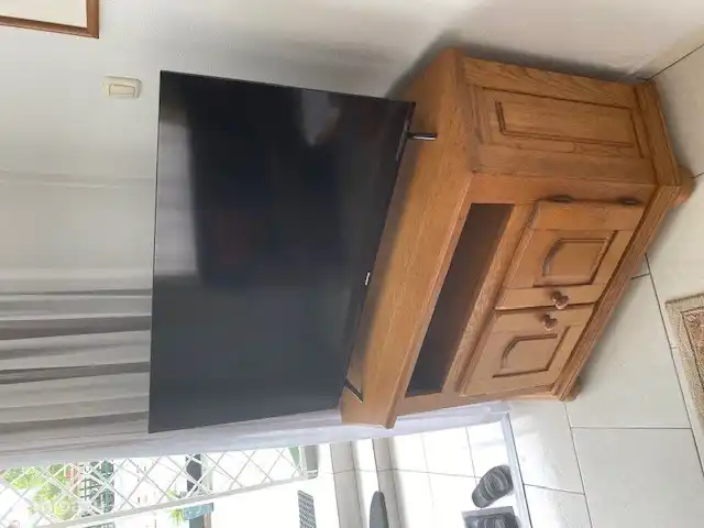 TV cabinet with large TV