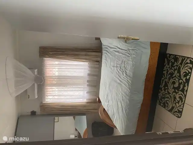 Double bed in large room