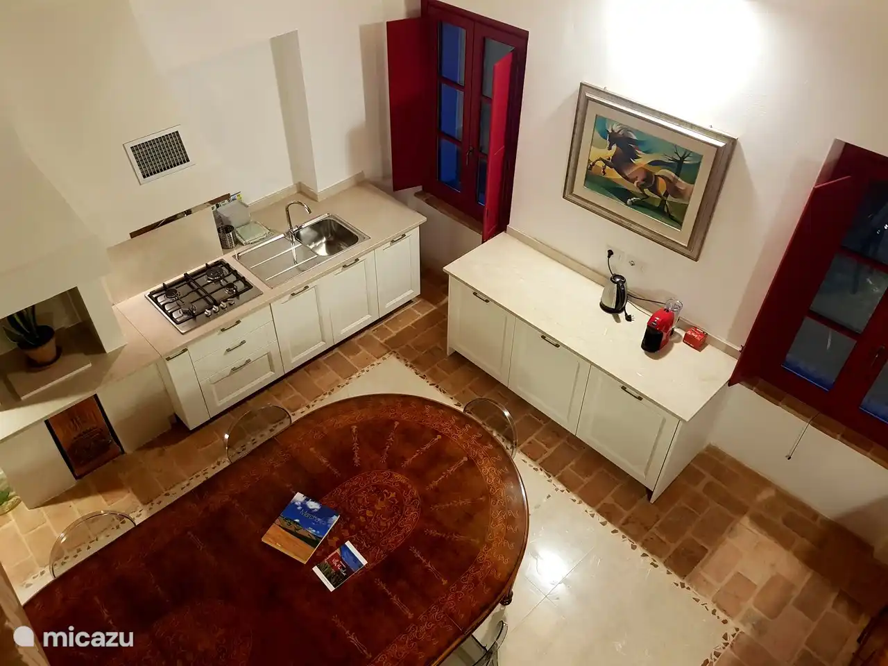 Kitchen with a separate refrigerator for each Suite, gas hob, dishwasher, coffee machine, kettle and kitchen utensils