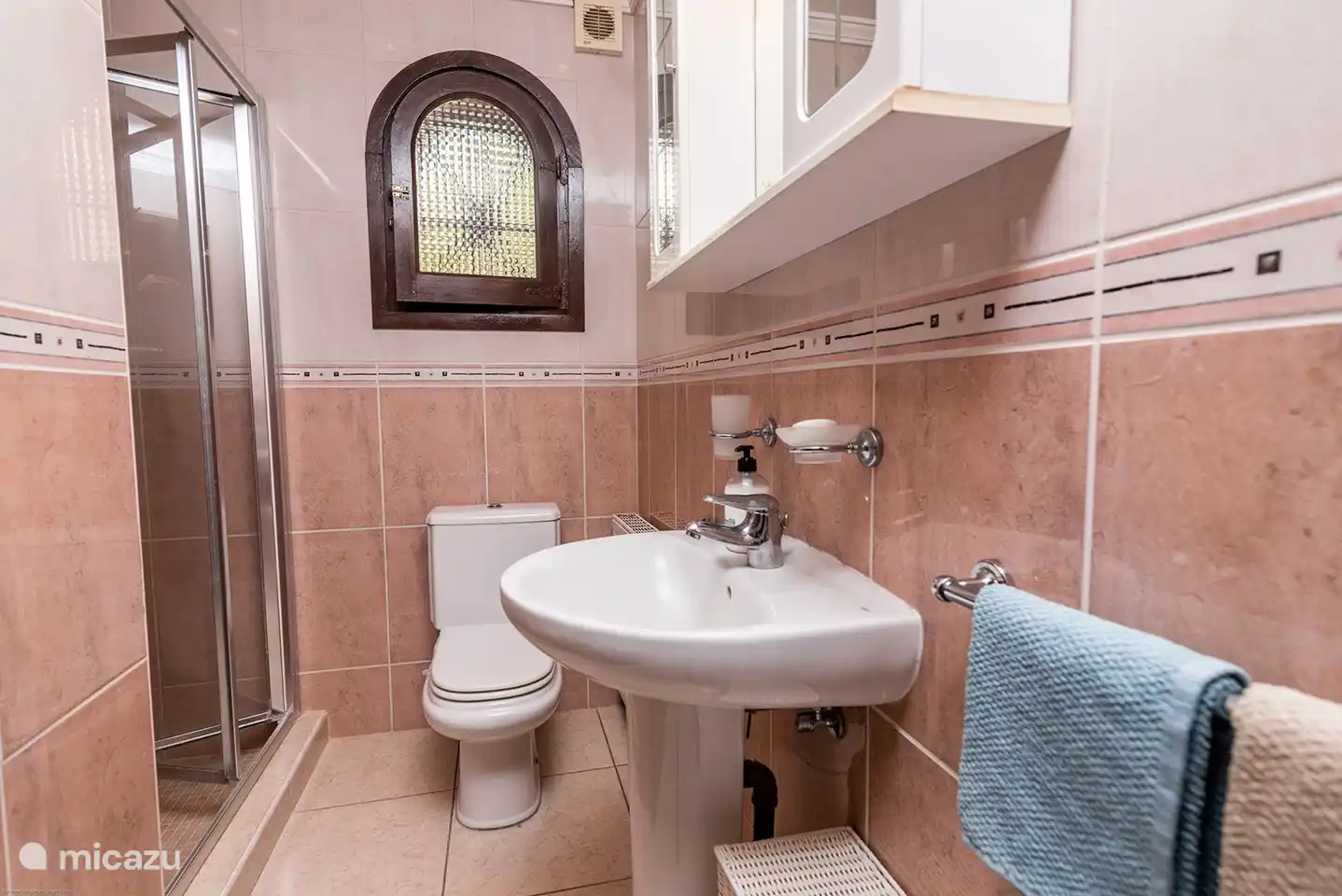 Bathroom 1 with shower, toilet and sink