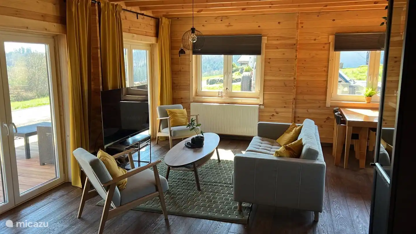 Sitzecke und Küche Holzhäuser in Wagenhausen (Zur Au 4)