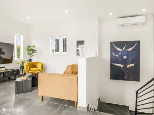 Papaya Resort huren in Curaçao, Banda Abou (west), Grote Berg - appartement Huiskamer met trap naar beneden