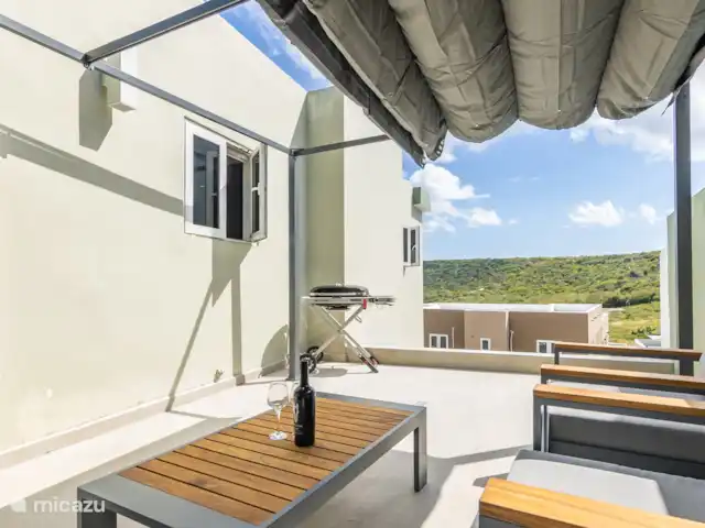 Papaya Resort huren in Curaçao, Banda Abou (west), Grote Berg - appartement Terras met loungehoek