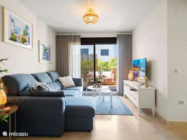 Location de Vacances Espagne, Costa del Sol, La Cala de Mijas, appartement - Casa TaJo Séjour avec vue sur l'extérieur.