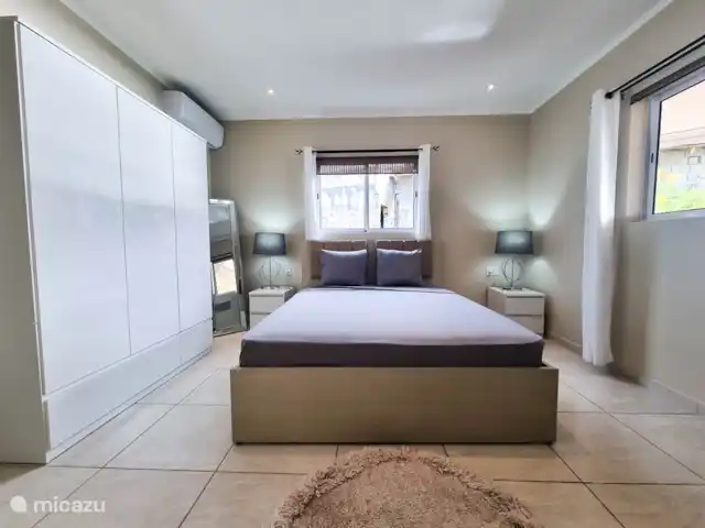 Villa con piscina y jacuzzi/Vista al mar en Curazao, Bandabou (oeste), Cas Abao - villa Dormitorio con cama Queen
