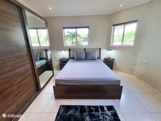 Villa con piscina y jacuzzi/Vista al mar en Curazao, Bandabou (oeste), Cas Abao - villa Dormitorio con cama Queen