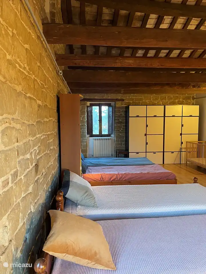 Grande chambre et salle de jeux