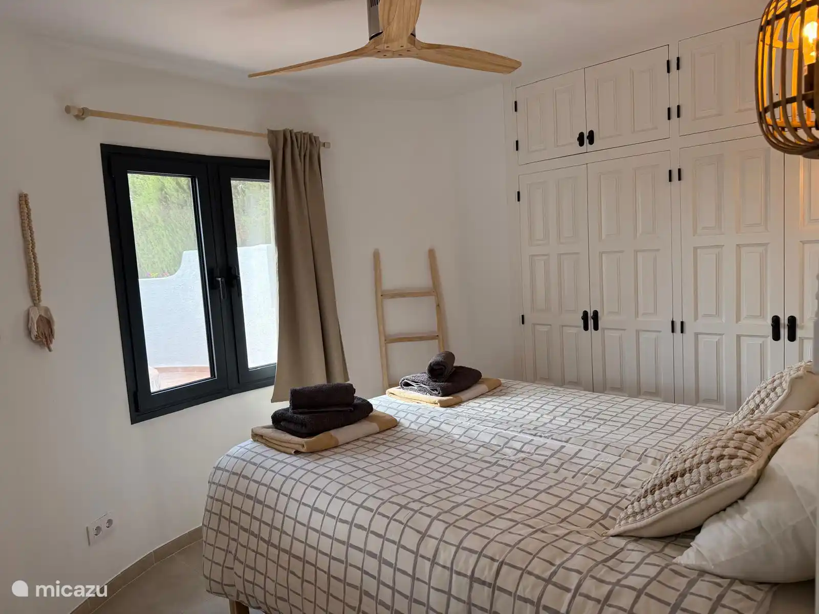 1 of the 2 bedrooms on the ground floor