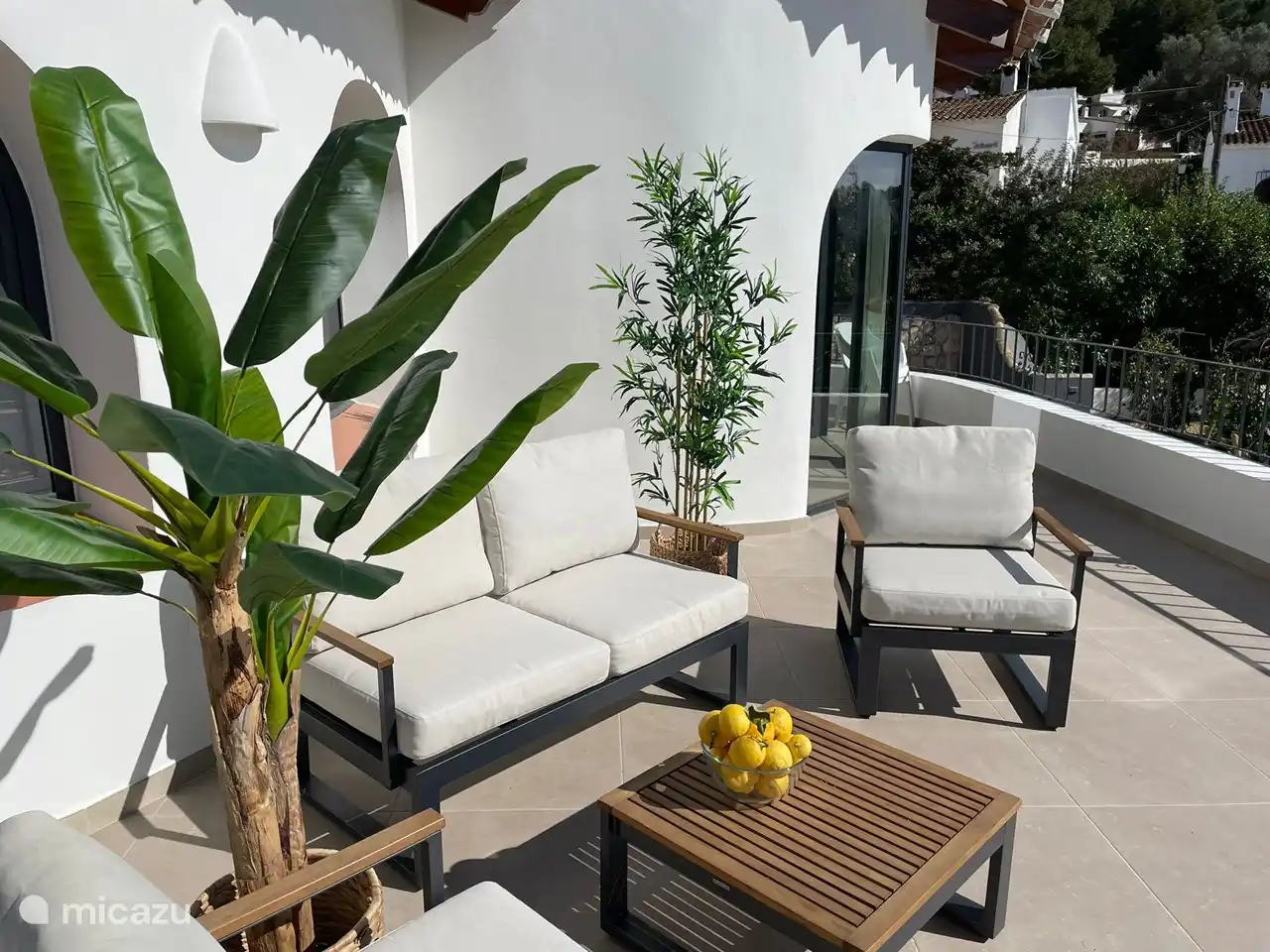 the seat on top of the terrace near the living room