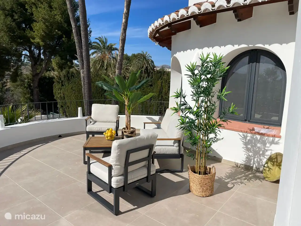 the seat on top of the terrace near the living room
