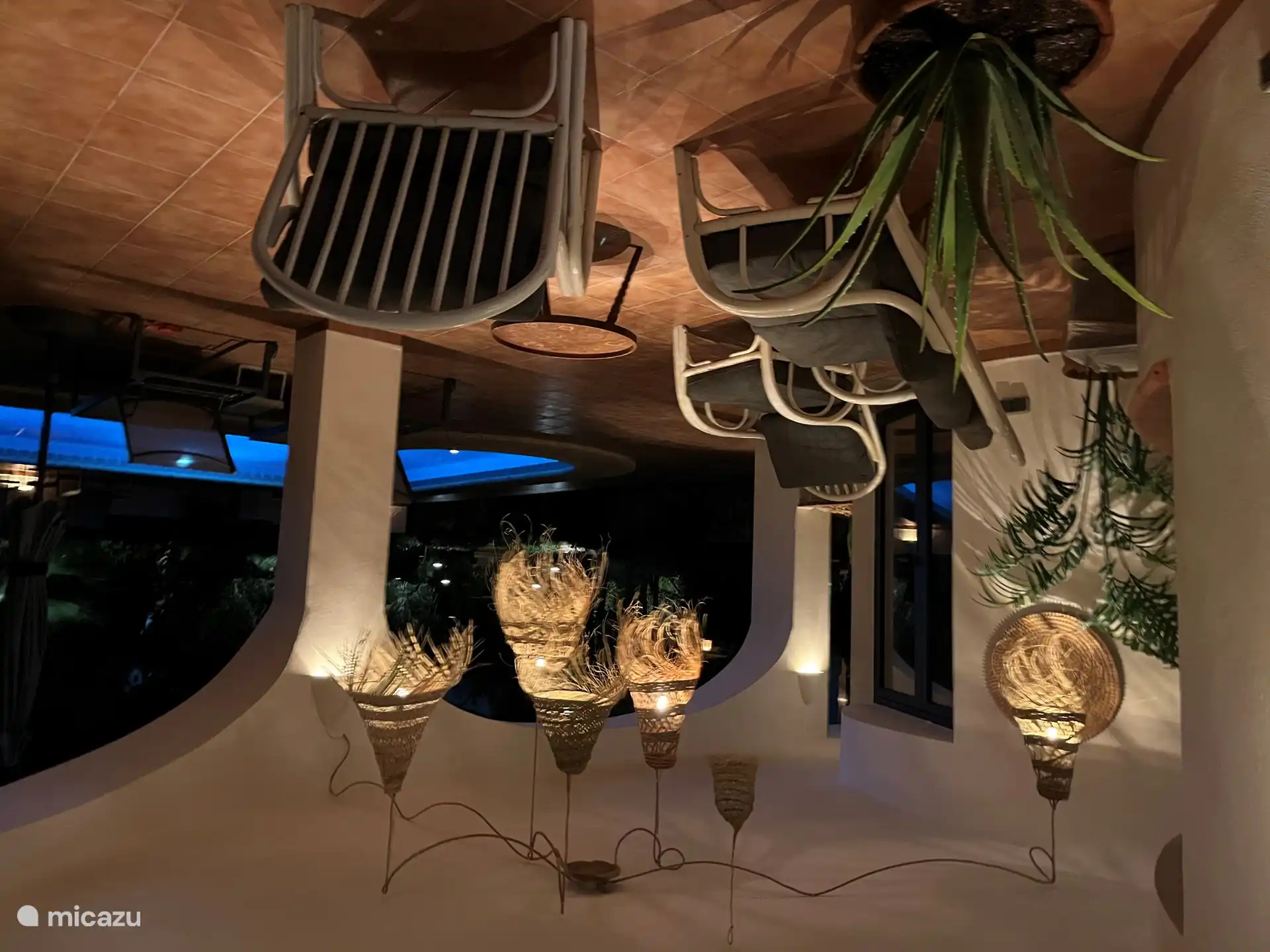 the cozy covered terrace in front of the apartment