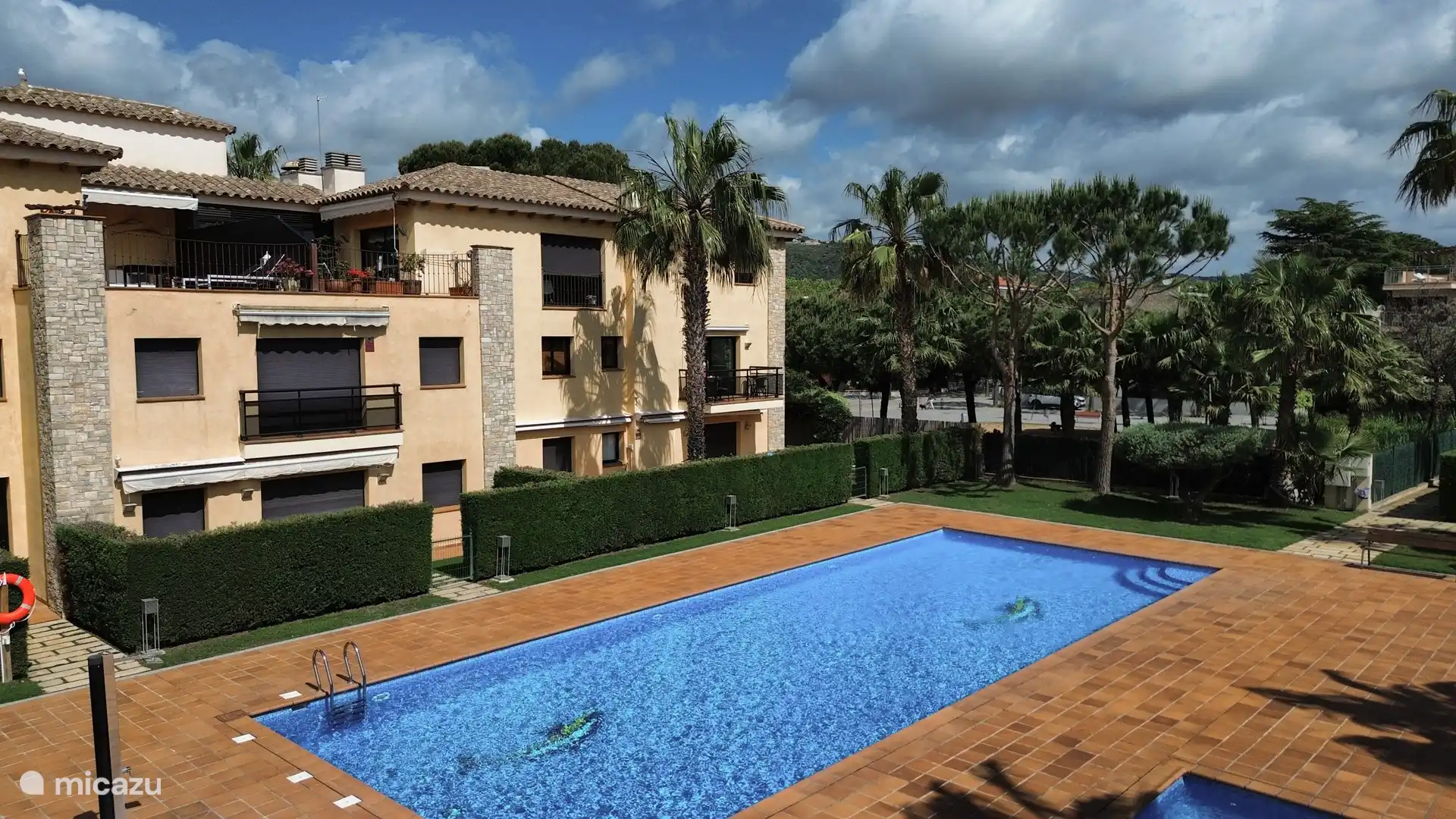 View from the pool to the apartment.