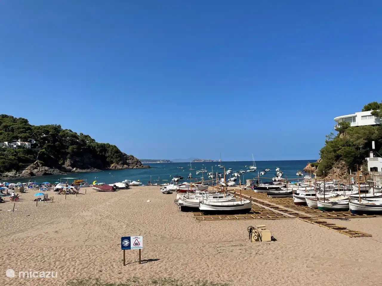 fishing boats on the beach.