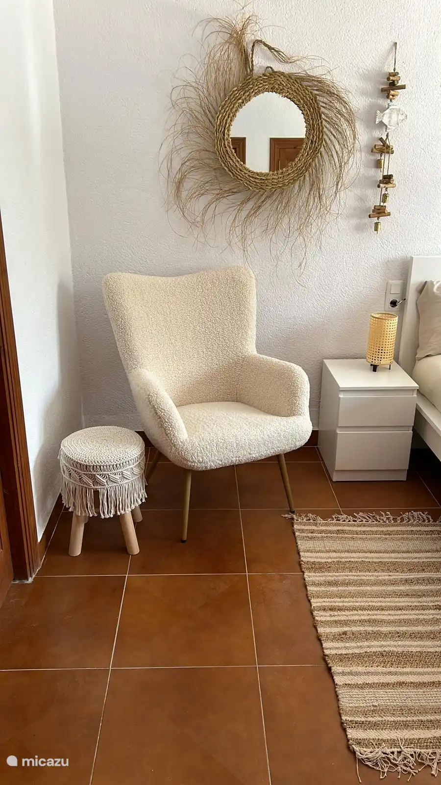 Bedroom 1 is spacious and has a seating area 