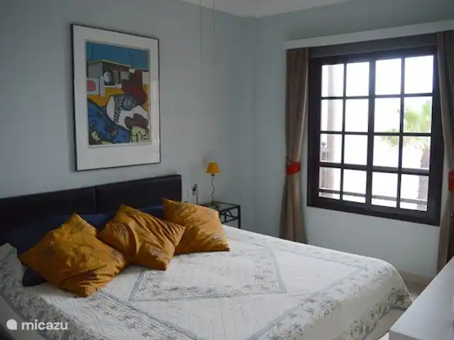 appartement huren in Spanje, Tenerife, Costa del Silencio – Balcon del Mar De slaapkamer, vanuit het bed ziet men al de oceaan.