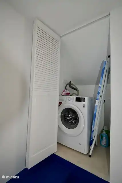 The villa has its own washing machine and drying racks