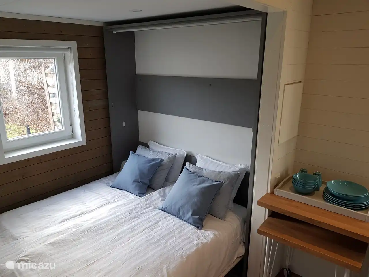 A lovely double bed. If you prefer to sleep separately, there is another sleeping option in the loft.