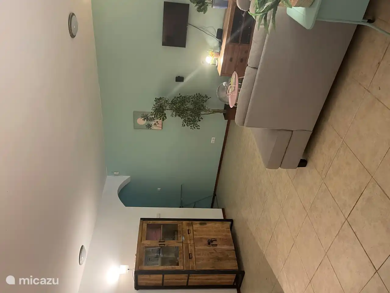 The spacious living room provides a fresh and spacious feeling