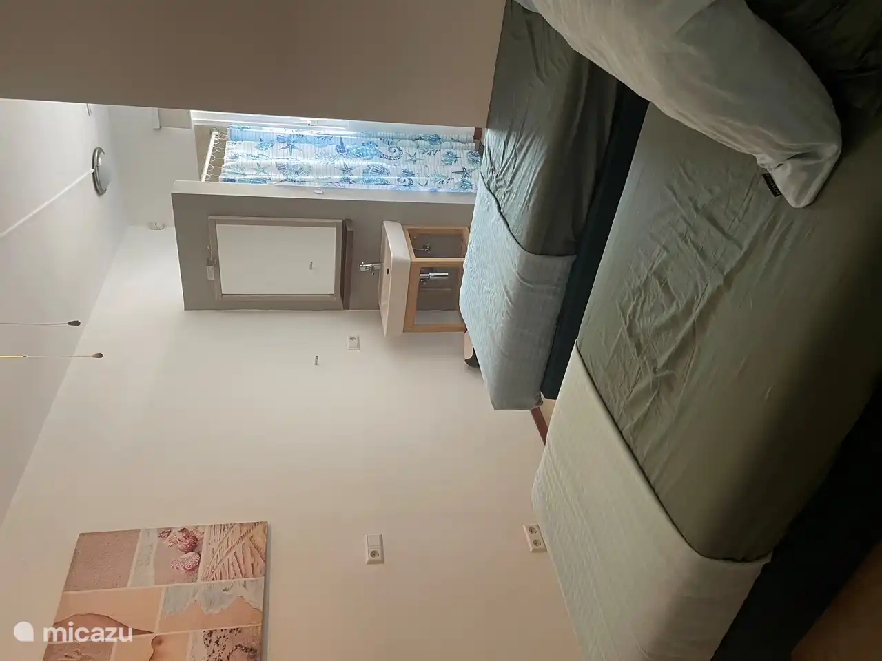 The 2nd bedroom also has its own shower and sink in the room. This room also has air conditioning and a ceiling fan.