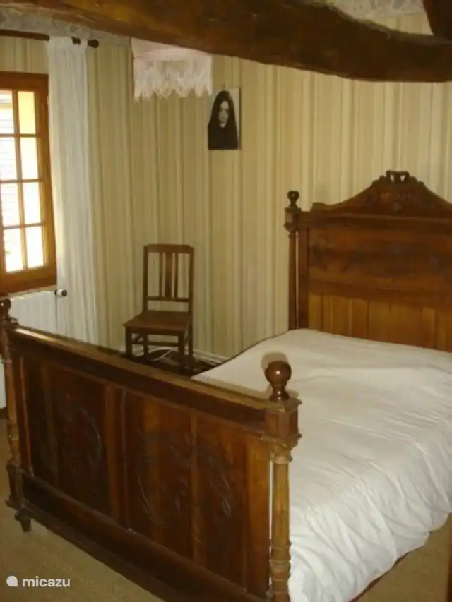 Schlafzimmer 2 im Obergeschoss mit 1 Doppelbett