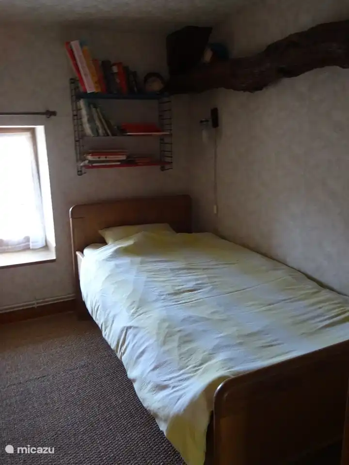 Schlafzimmer 4 im Obergeschoss mit 1 Doppelbett