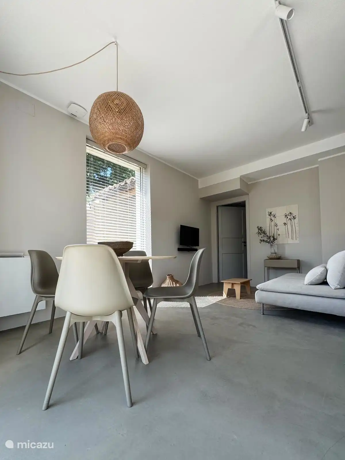 Zithoek en eettafel Appartement Rilassati