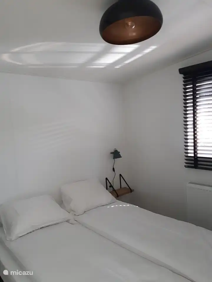 Schönes Schlafzimmer mit Doppelbett