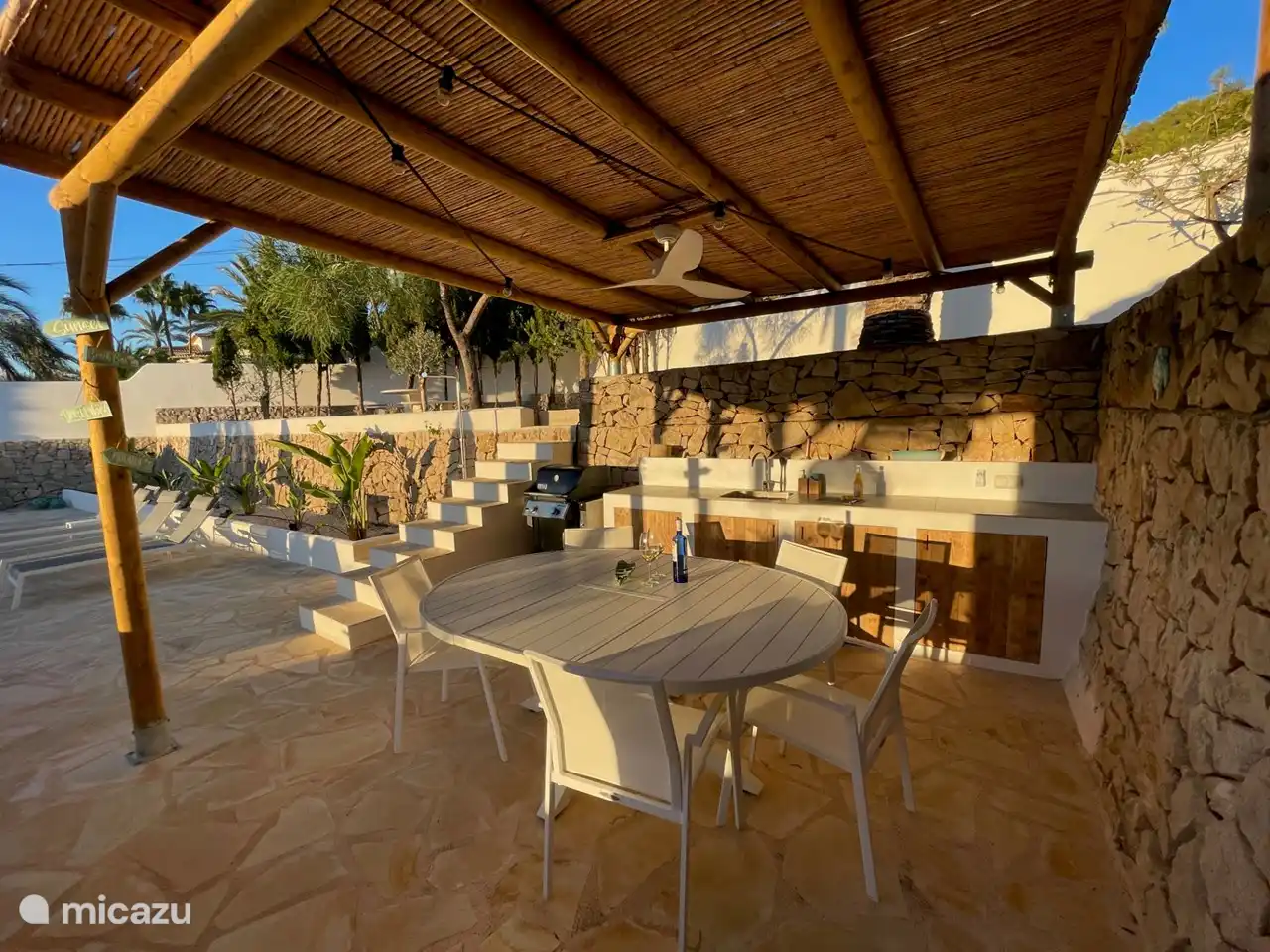 You don't have to go inside to grab a cool glass of wine, beer or a soft drink thanks to the refrigerator in the outdoor kitchen.