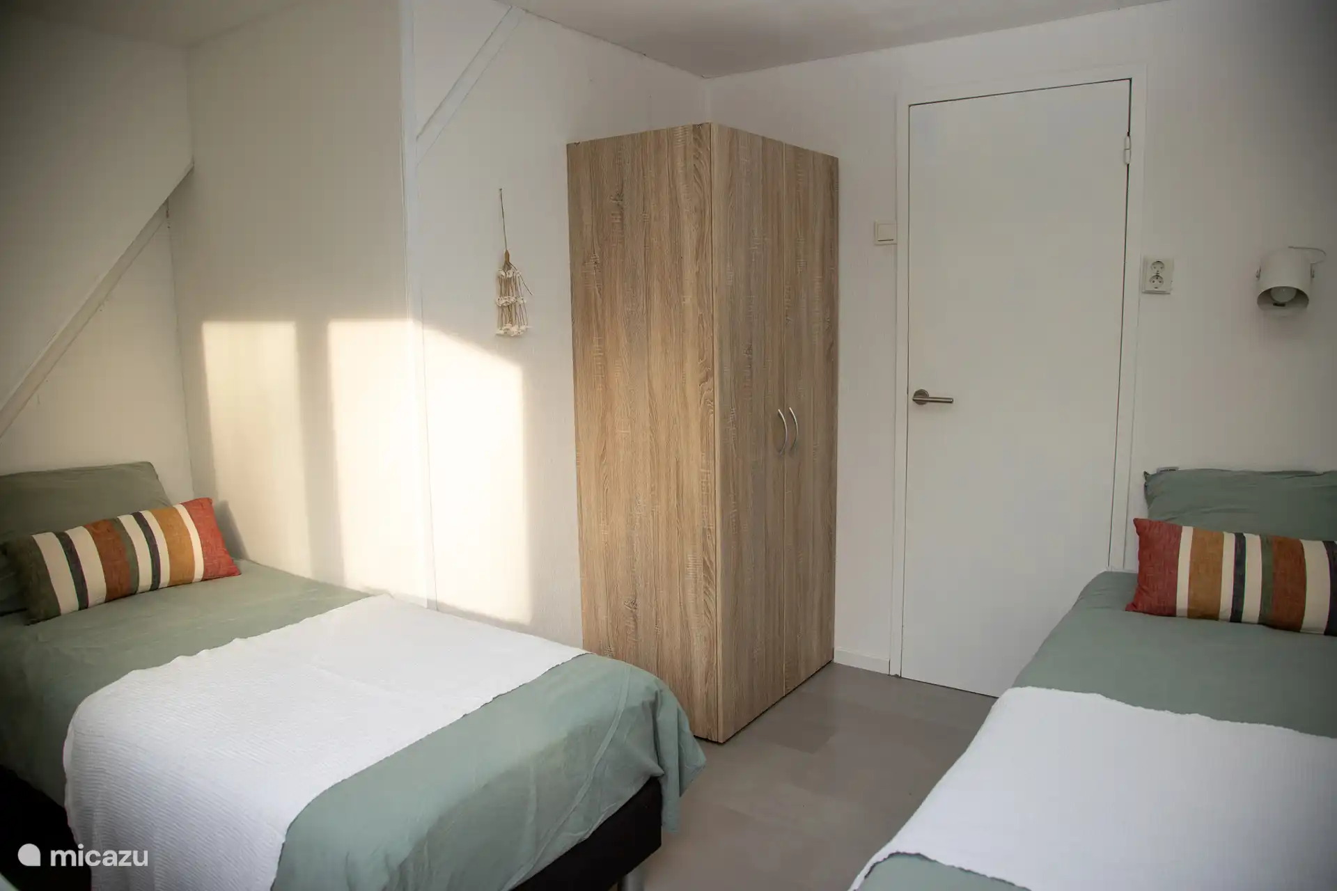 Slaapkamer 2: twee eenperoons bedden (80 x 2.00)
Afmeting beddengoed: standaard