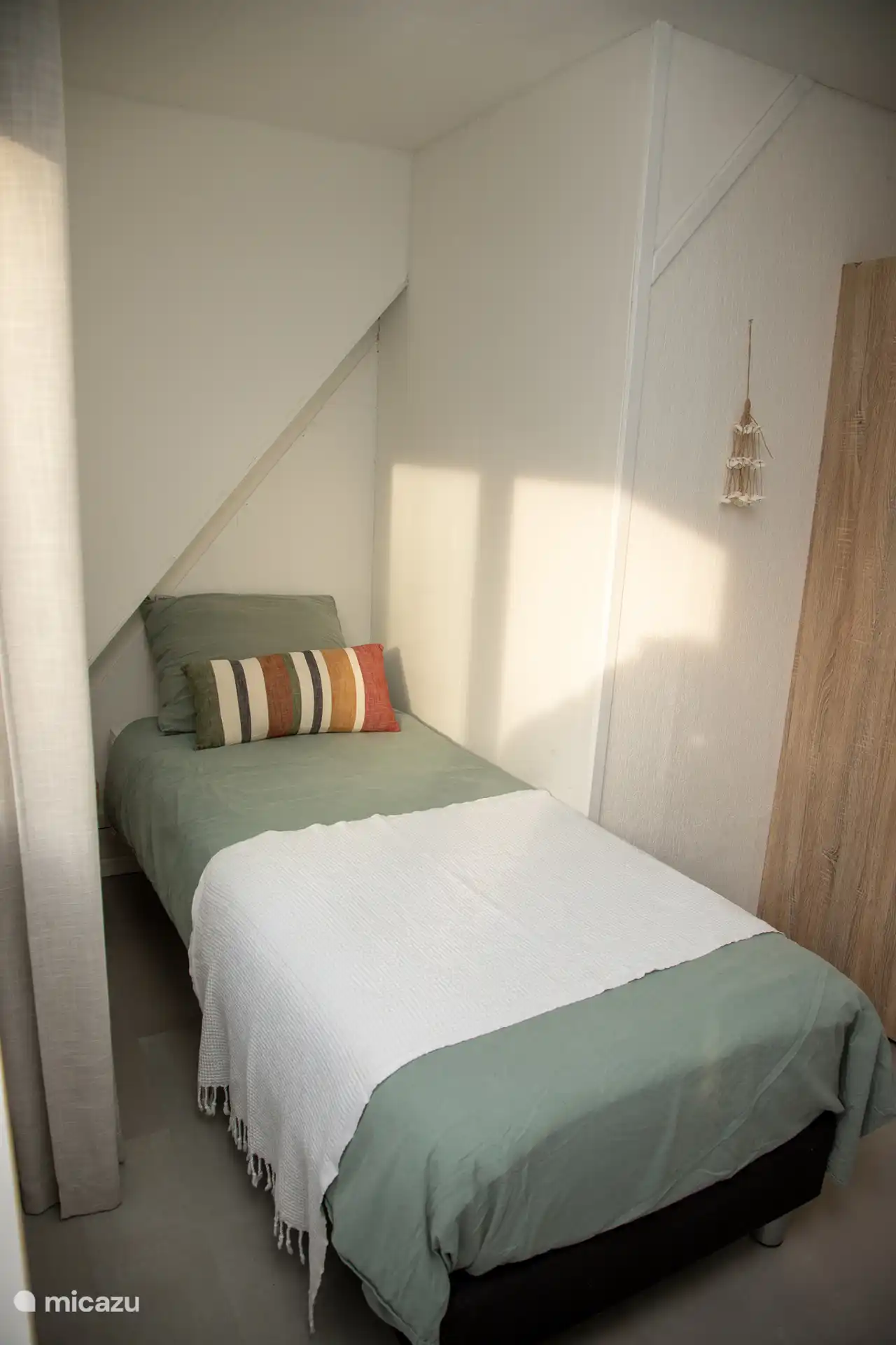 Slaapkamer 2: twee eenperoons bedden (80 x 2.00)
Afmeting beddengoed: standaard