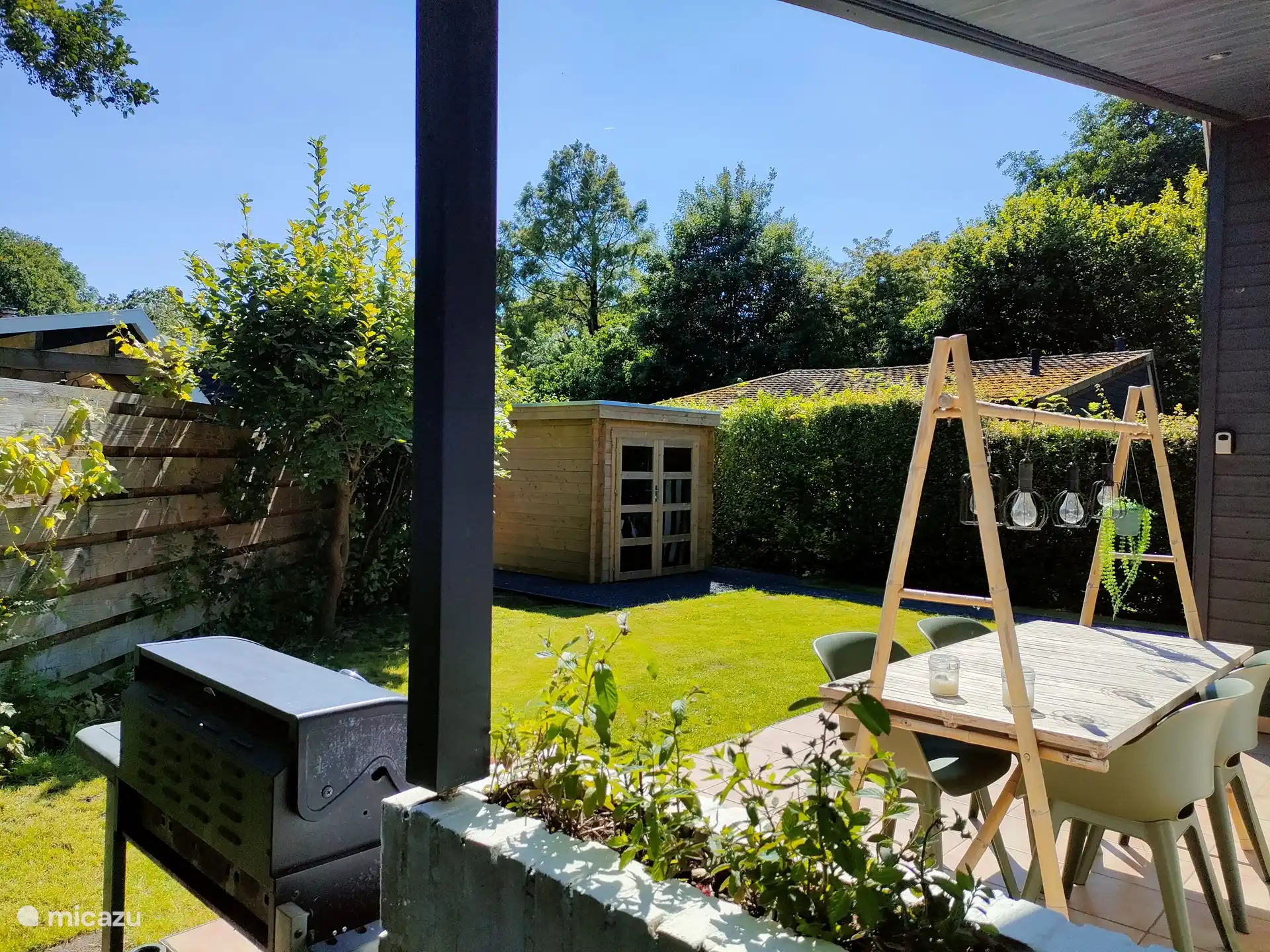 Completely private south-facing garden surrounded by greenery. Large gas barbecue available.