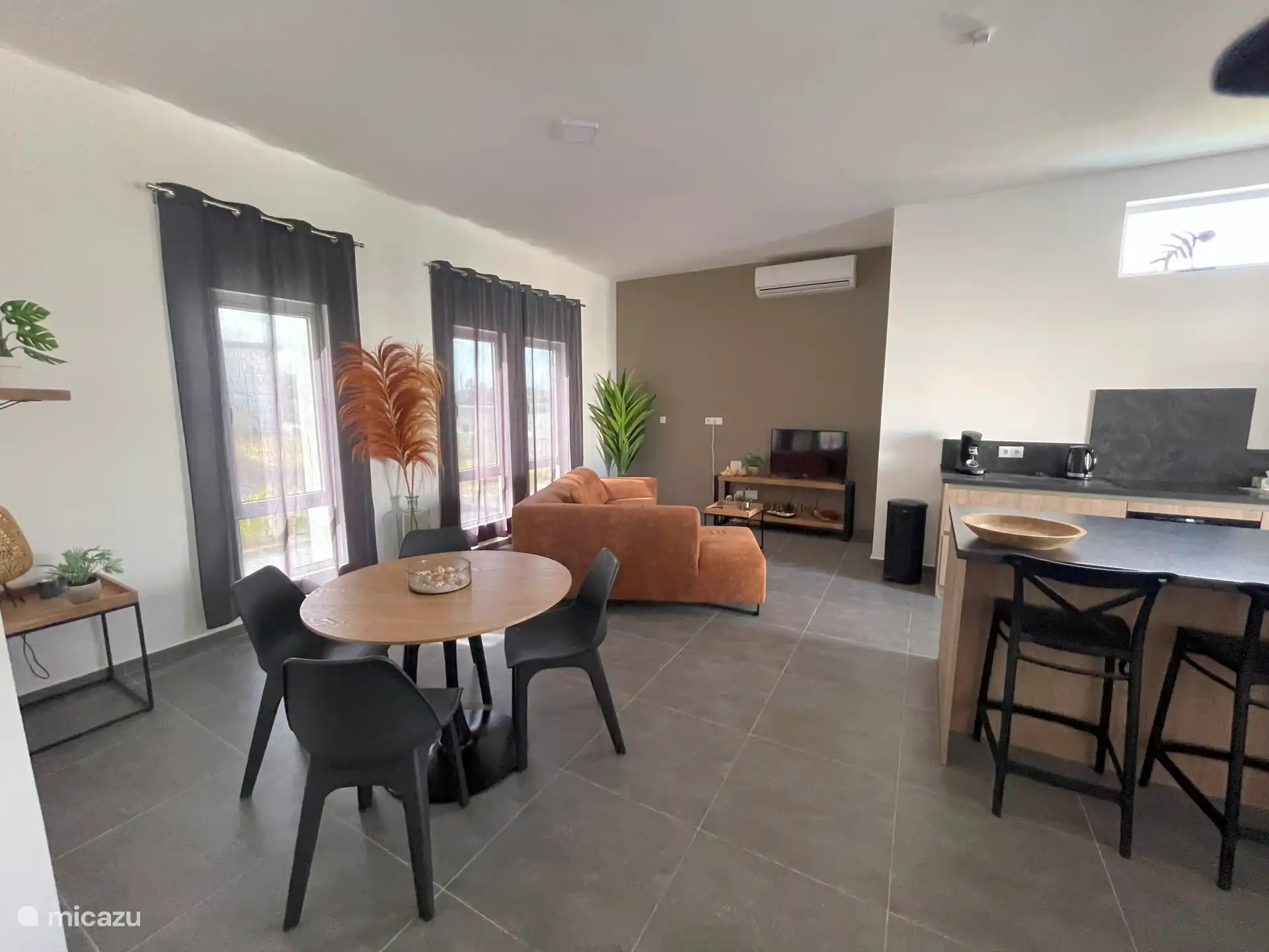 Spacious living room with air conditioning and IP TV