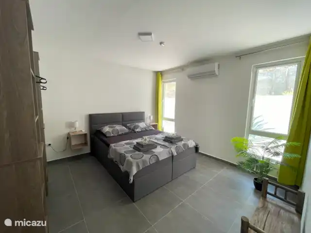 María Pampoen en Curazao, Banda Arriba (este), Marie Pampoen - villa Amplio dormitorio 1 planta baja con aire acondicionado