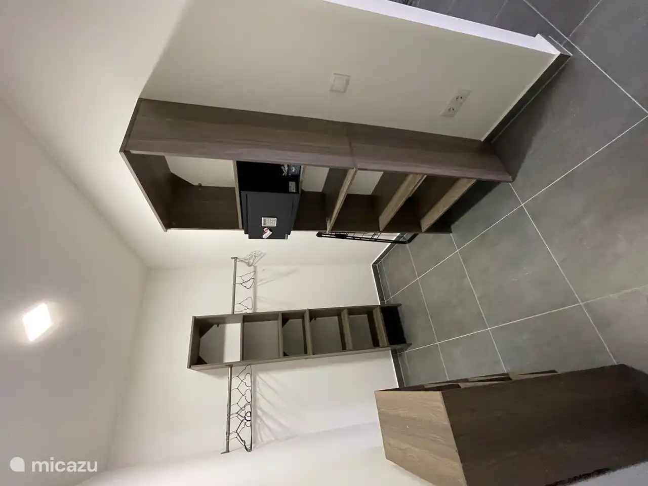 Walk in closet on 1st floor with safe