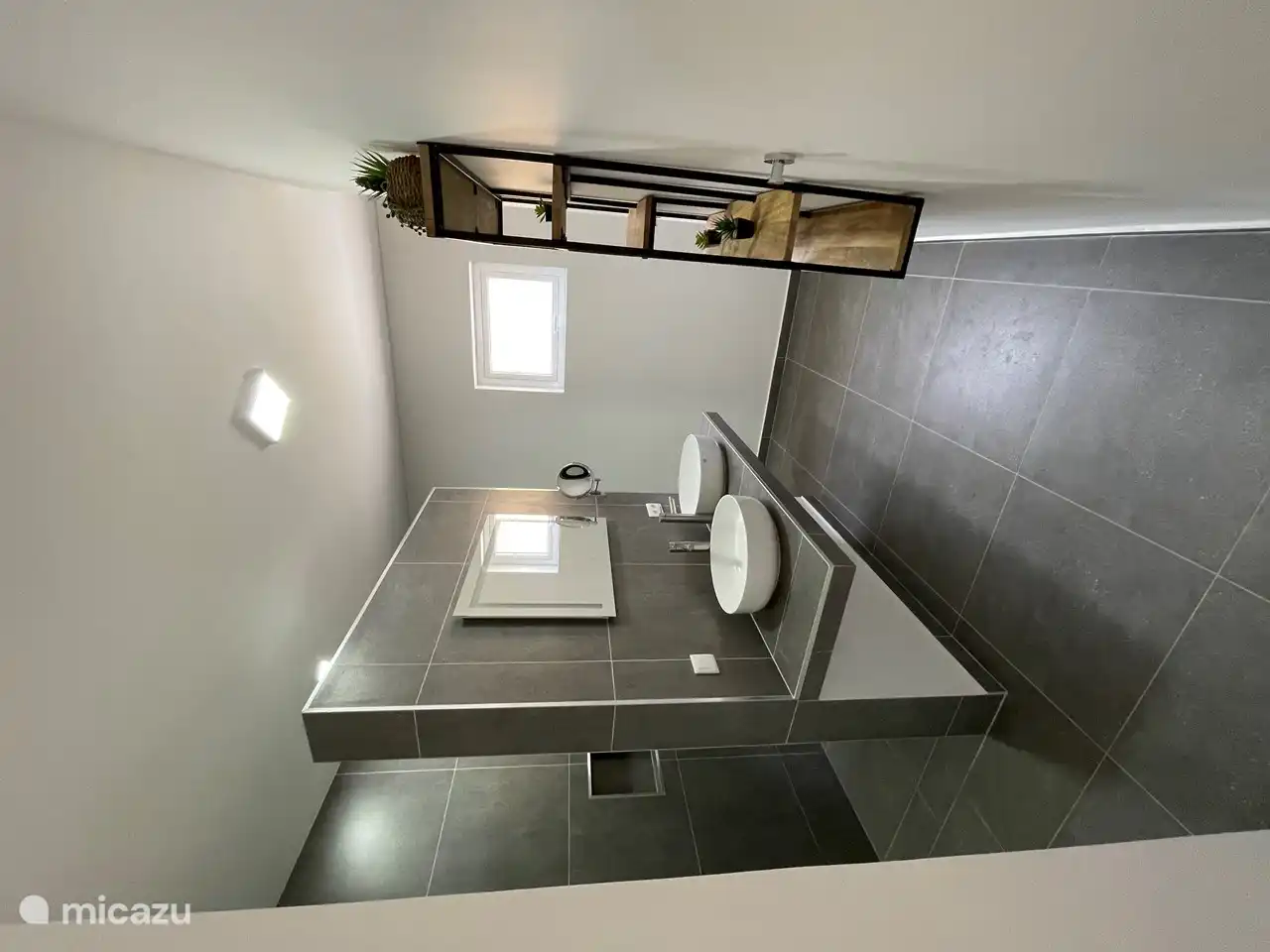 Bathroom 1st floor with double sink and toilet