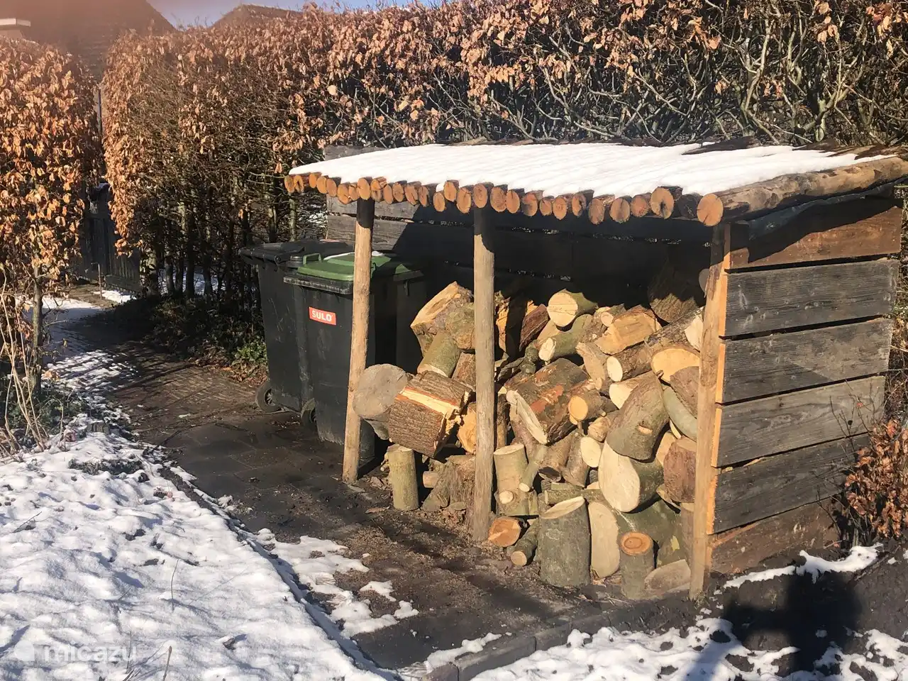 Our wood storage in the garden