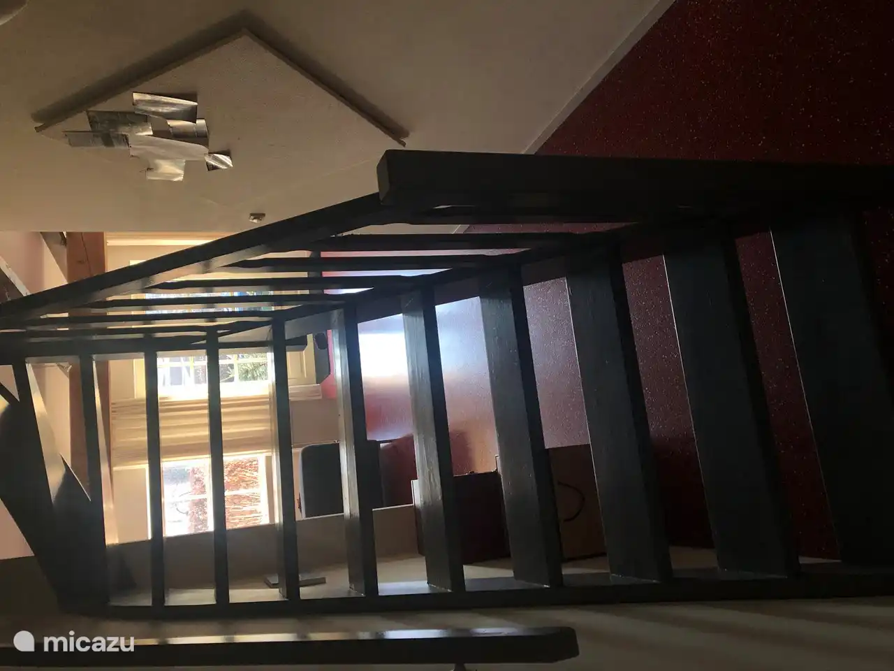 This staircase takes you to the bedrooms and bathroom.